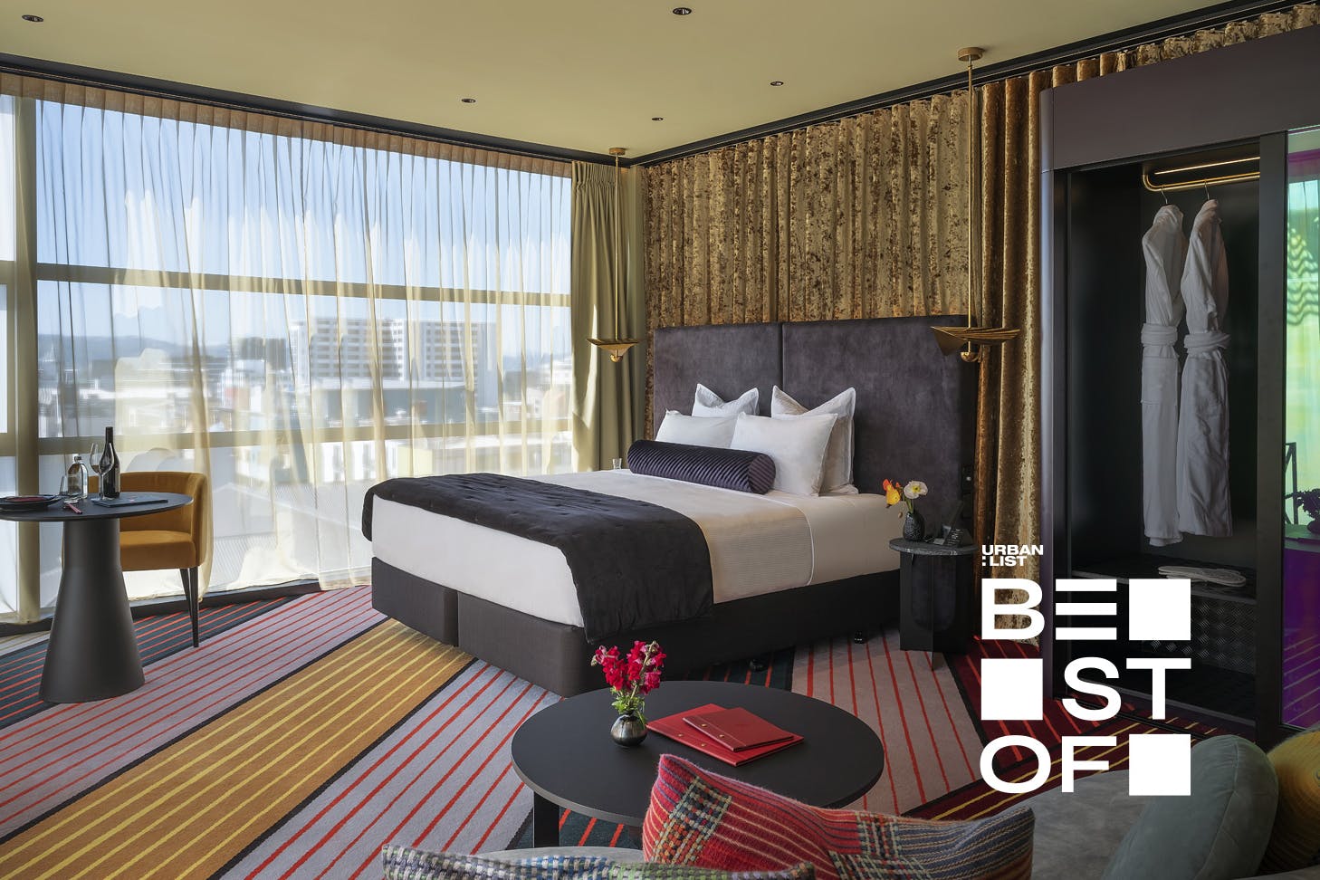 The sumptuous Blush King room at Naumi Wellington, one of the best hotels in Wellington.